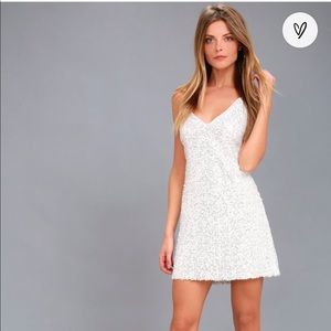 Lulu’s white sequin backless dress.